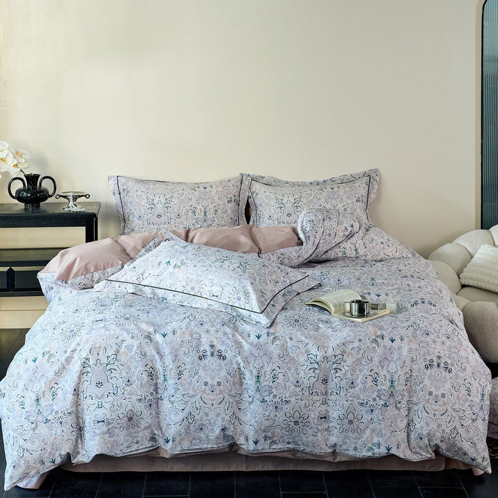 Reversible cotton satin bedding with delicate watercolor floral print and satin edge