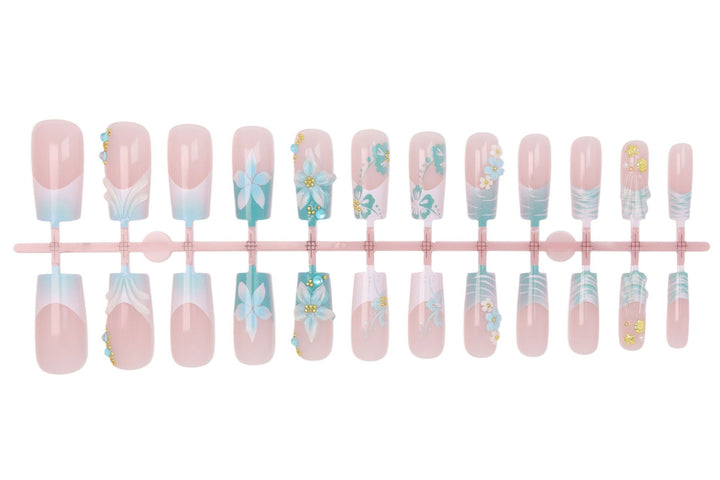 Acrylic nail set with elegant floral decorations and glitter accents Stornfield