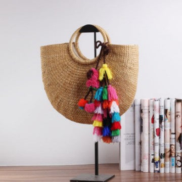 Handcrafted straw bag with colorful tassels Stornfield