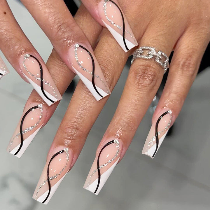 Artistic Nail Extensions with Elegant Glitter Design Stornfield