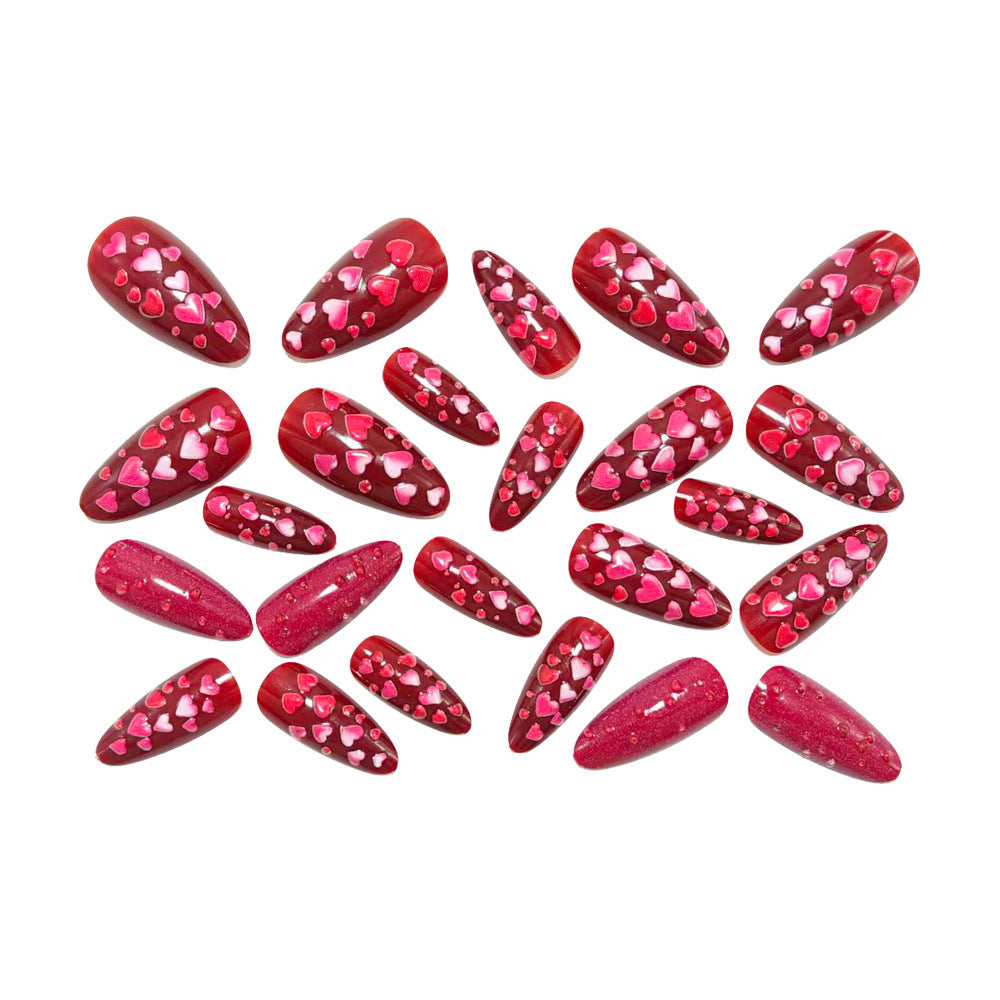 Artificial nails with heart design and gloss finish Stornfield