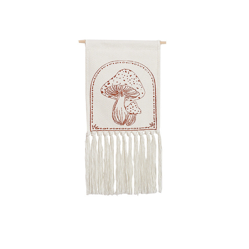 Woven wall hanging with hand-drawn mushroom motif and long cotton fringes Stornfield