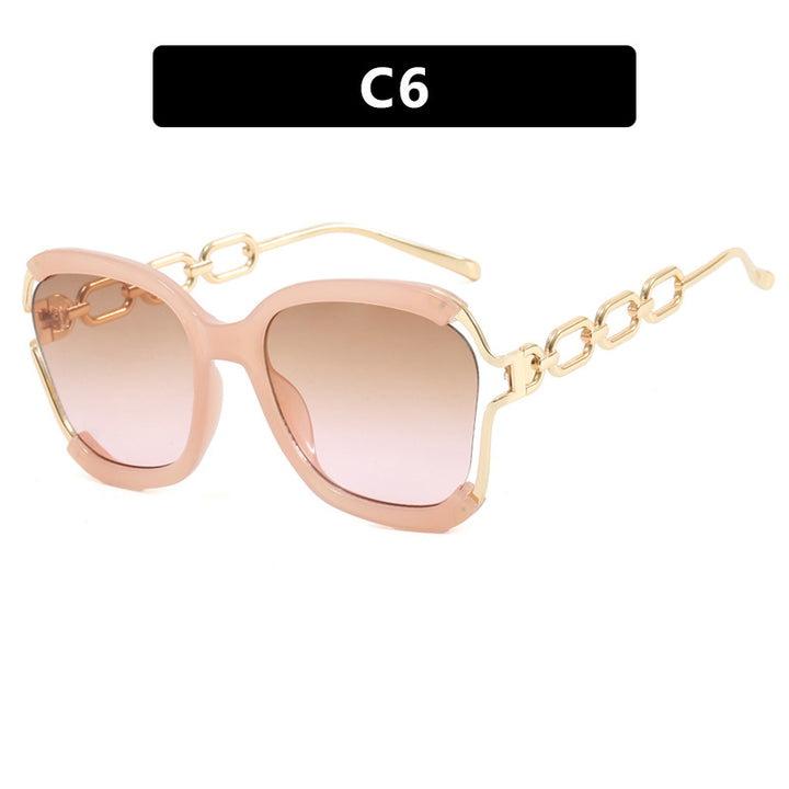 Ladies fashionable sunglasses with golden chain details Stornfield