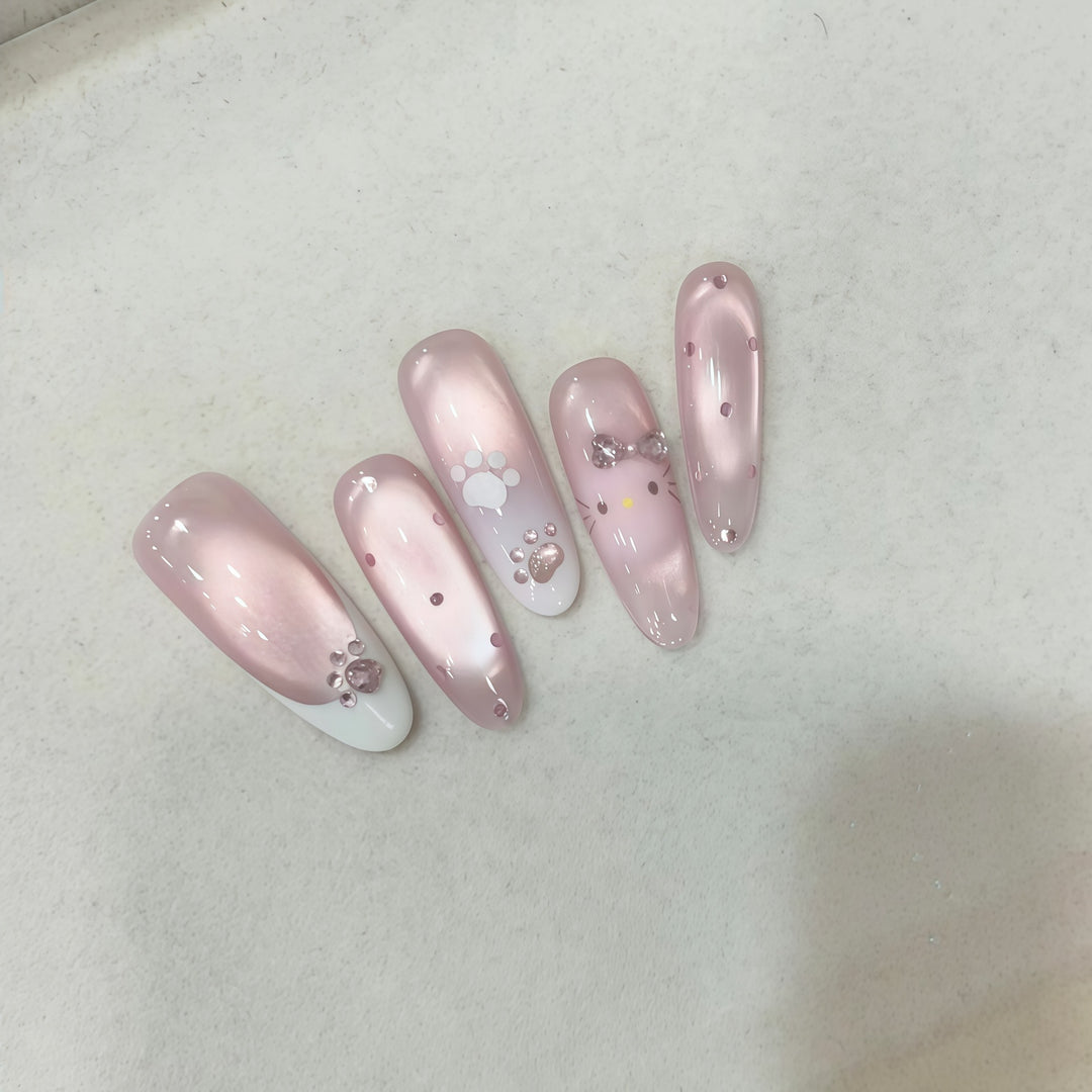 Artificial nail tips with playful penguin and paw print design Stornfield