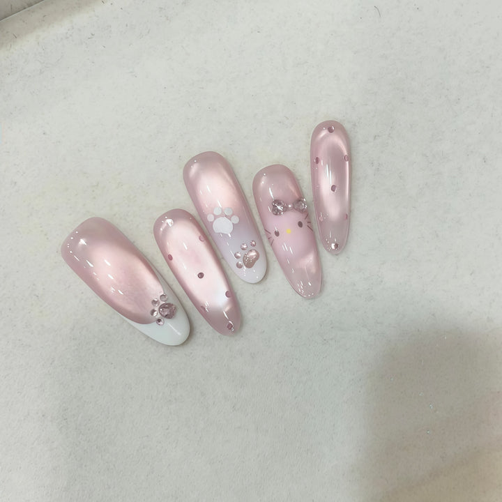 Artificial nail tips with playful penguin and paw print design Stornfield