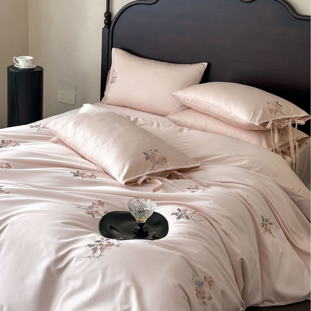 Satin bed cover set with embroidered rose branches, bow ties and silky-matte finish