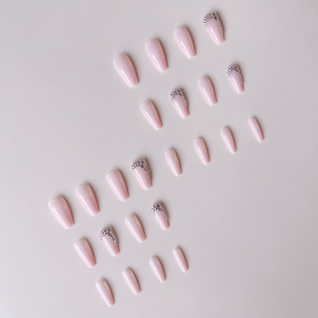 Artificial nail set with glamorous rhinestone embellishments Stornfield