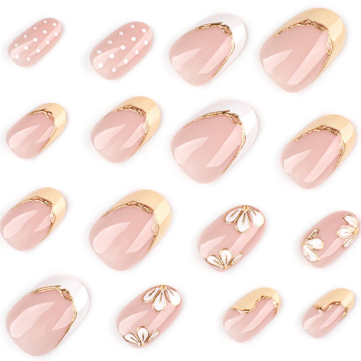 Artful Nail Extensions with Floral Design and Elegant Gold Accents Stornfield
