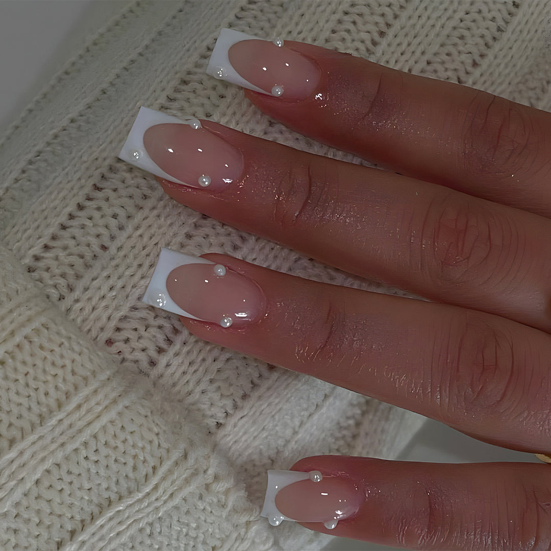 Artificial nail tips with elegant pearl accents Stornfield