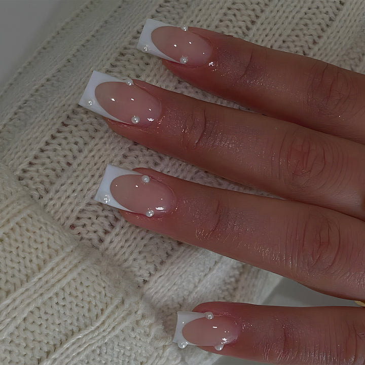 Artificial nail tips with elegant pearl accents Stornfield