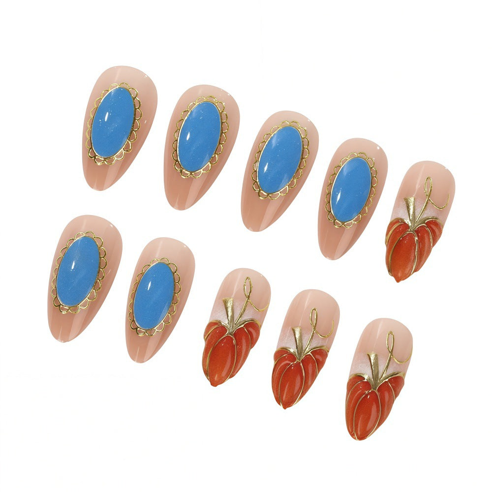 Creative artificial nails with autumn design and detailed accents Stornfield
