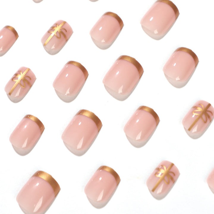 Elegant nail design with gold accents Stornfield