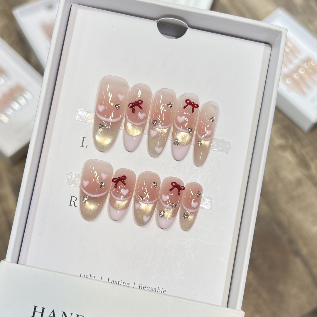 Decorative Press-On Nail Set with Heart and Bow Accents Stornfield