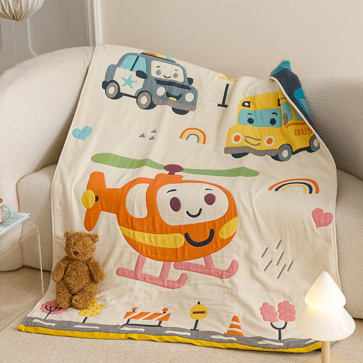 Kids' cuddly blanket with cheerful vehicle print made of soft microfibre