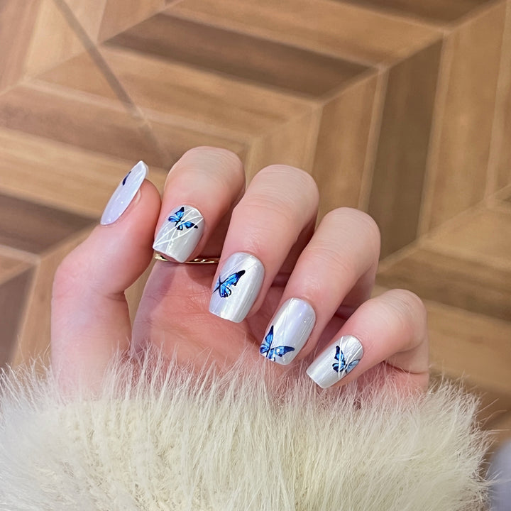 Creative nail extensions with intricate butterfly design Stornfield
