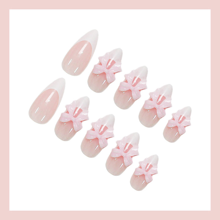 Acrylic nail set with playful bow decorations Stornfield