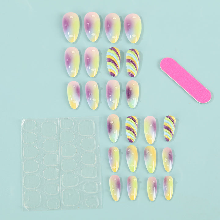 Artificial nails with soft ombre colors and creative patterns Stornfield