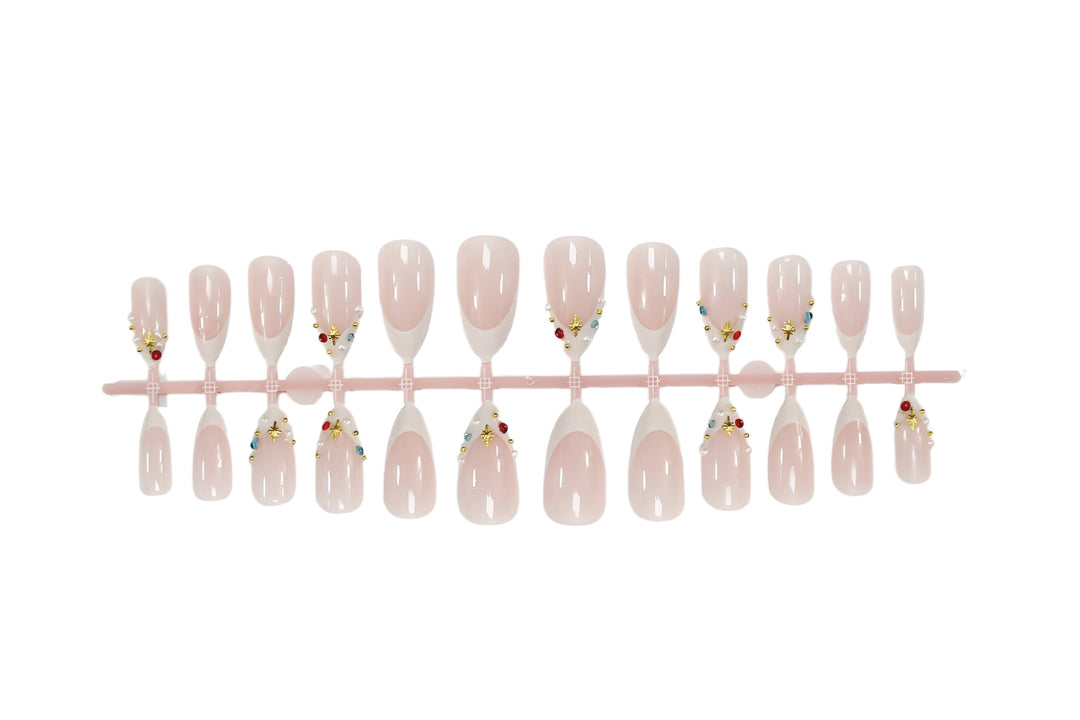 Acrylic nail set with glamorous embellishments and elegant accents Stornfield
