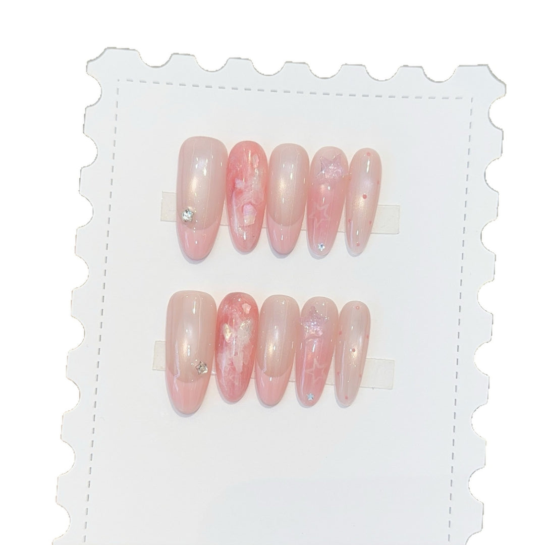 Artificial nails with delicate glitter and star motifs Stornfield