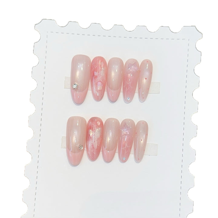 Artificial nails with delicate glitter and star motifs Stornfield