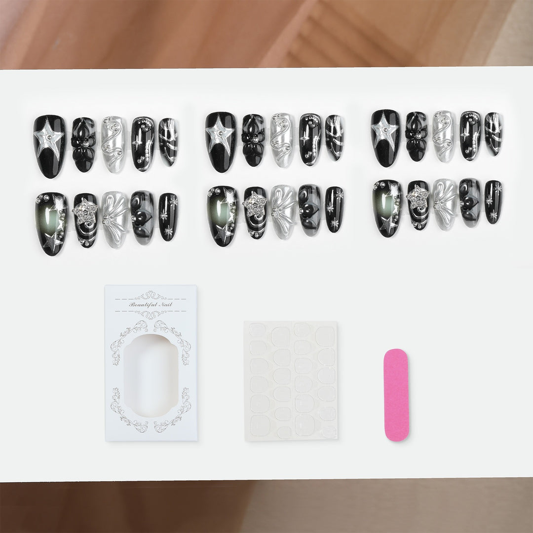 Artificial nail set with glamorous designs and unique 3D elements Stornfield