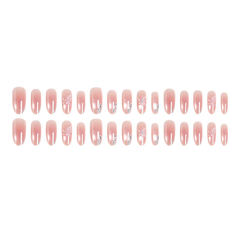 Acrylic nail set with elegant ombre design and sparkling accents Stornfield