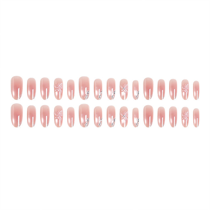 Acrylic nail set with elegant ombre design and sparkling accents Stornfield