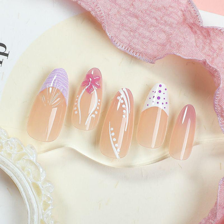Artifical nails with delicate floral and geometric patterns Stornfield