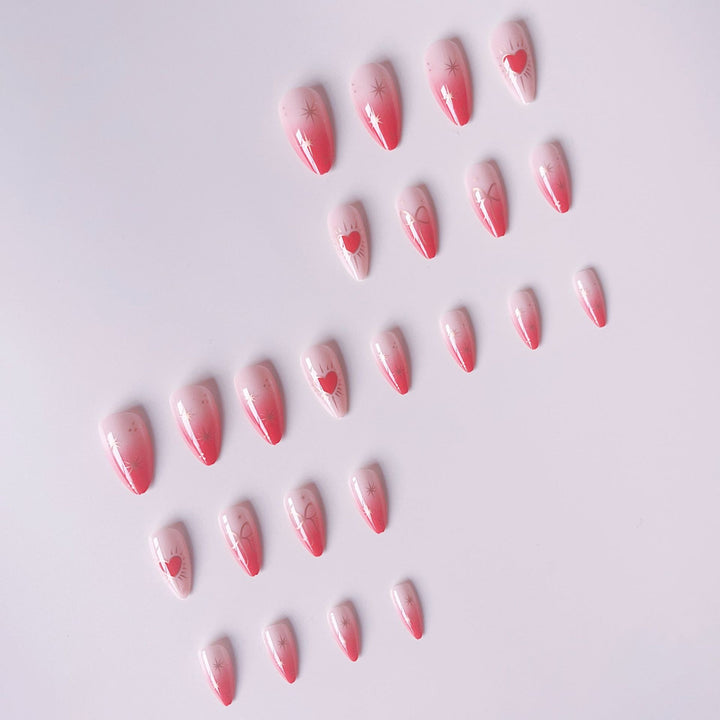 Glamorous artificial nail tips with heart and star decorations Stornfield