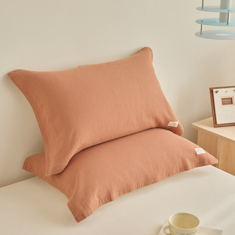 Textured cushion cover set made of cotton-linen blend with waffle structure