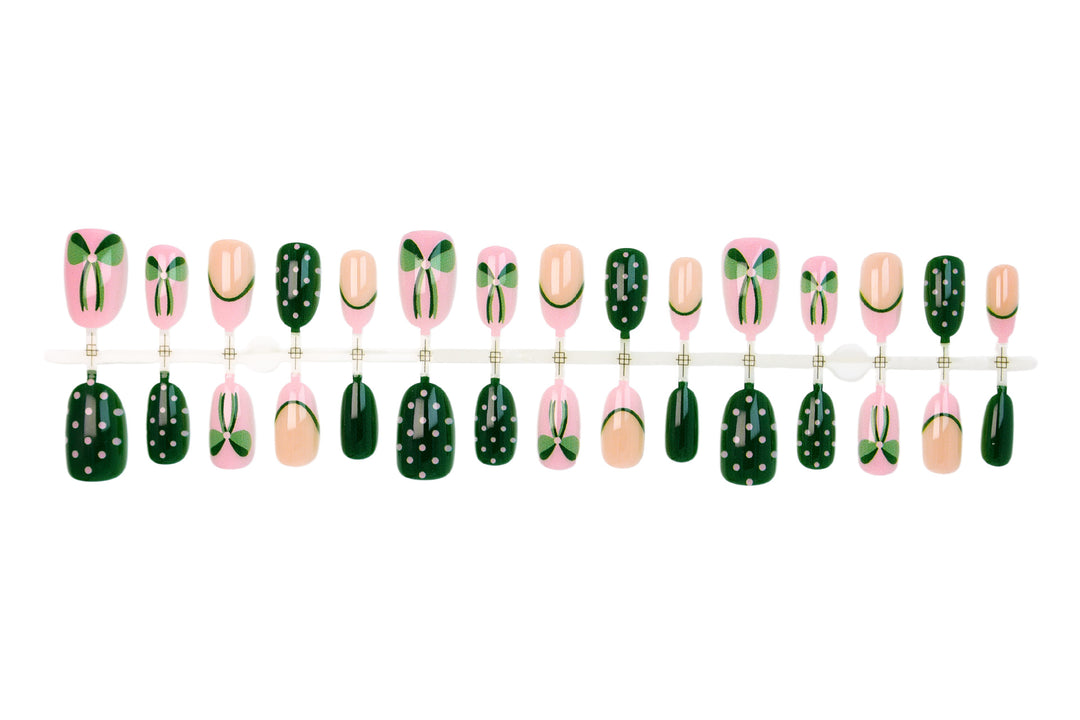 Art nail set with floral accents and playful designs Stornfield