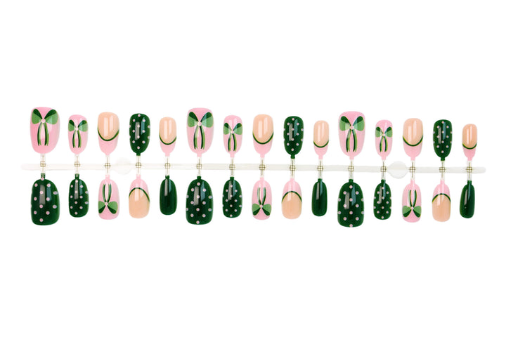 Art nail set with floral accents and playful designs Stornfield