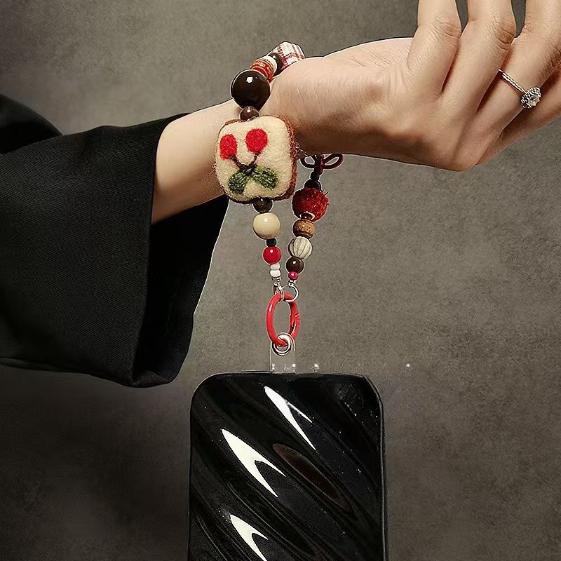 Playful Themed Beaded Keychain Stornfield