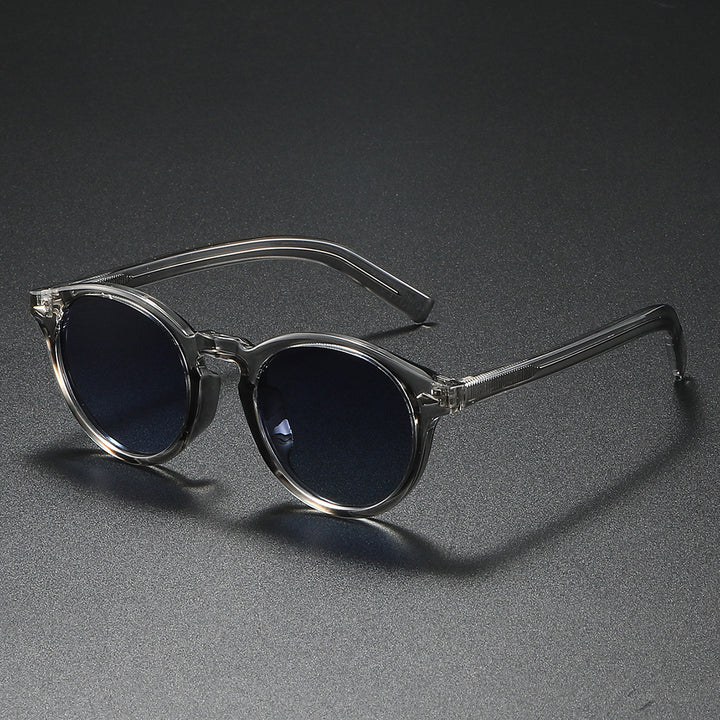 Ladies Round Sunglasses with Transparent Frame and Reflective Lenses Stornfield