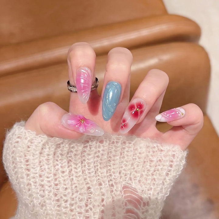 Artistic Press-On Nail Set with Floral and Abstract Designs Stornfield