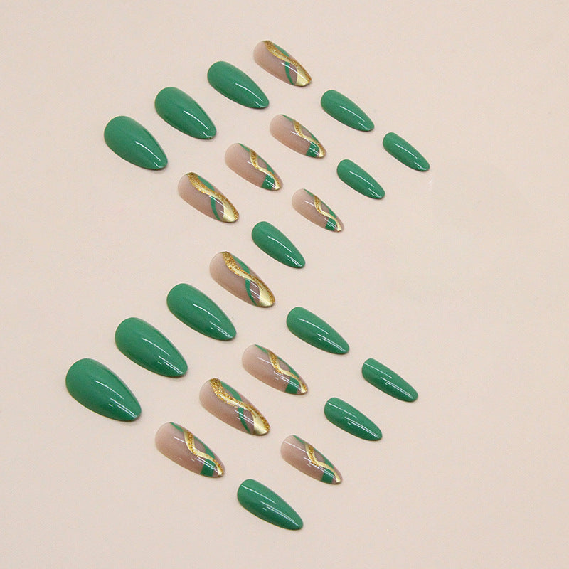 Glamorous artificial nails with elegant gold accents