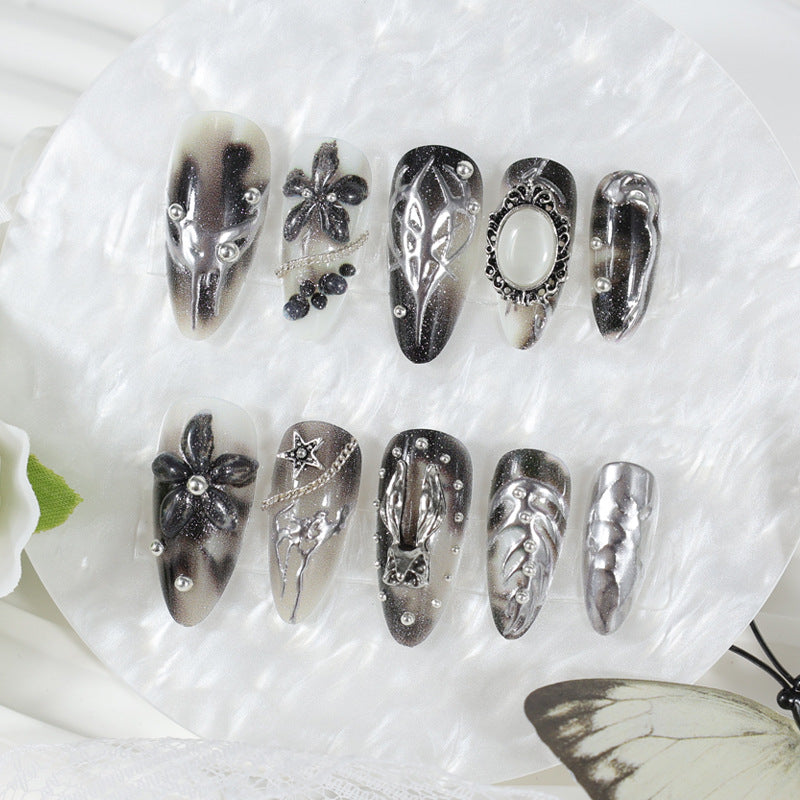 Artificial nail tips with glamorous black-and-white design Stornfield