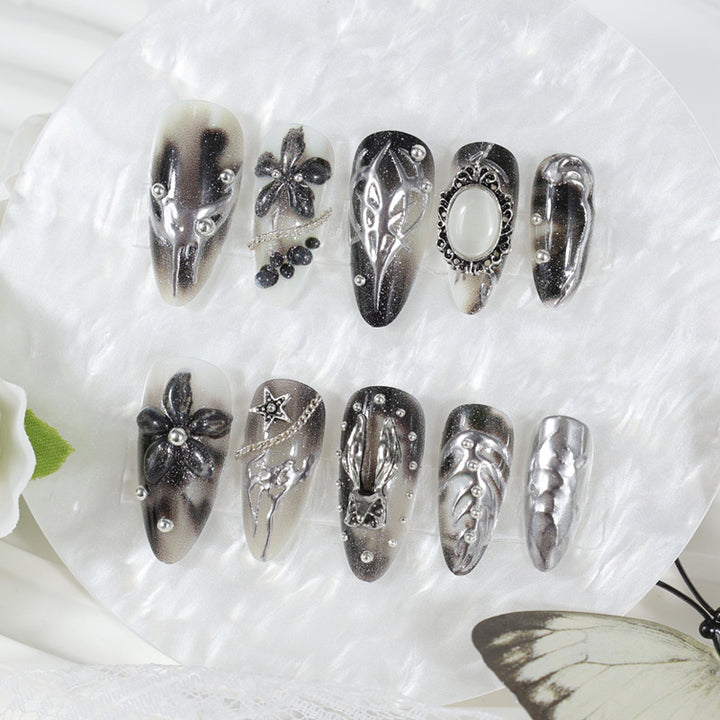 Artificial nail tips with glamorous black-and-white design Stornfield