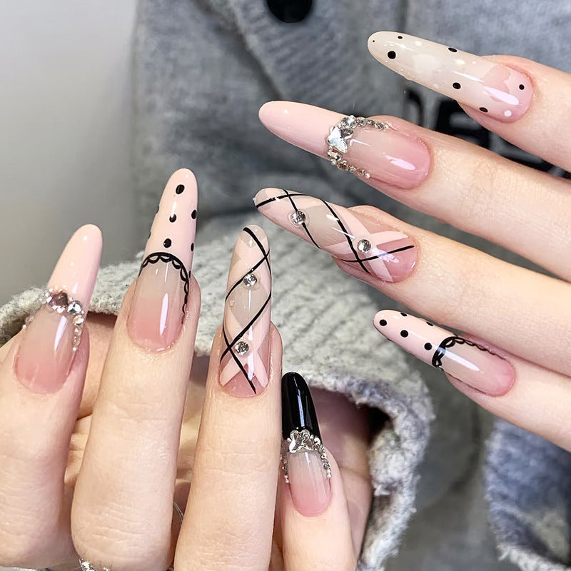 Artistic Press-On Nail Set with Elegant Patterns and Gems Stornfield