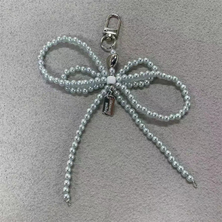 Elegant Pearl Bow Keychain Stornfield