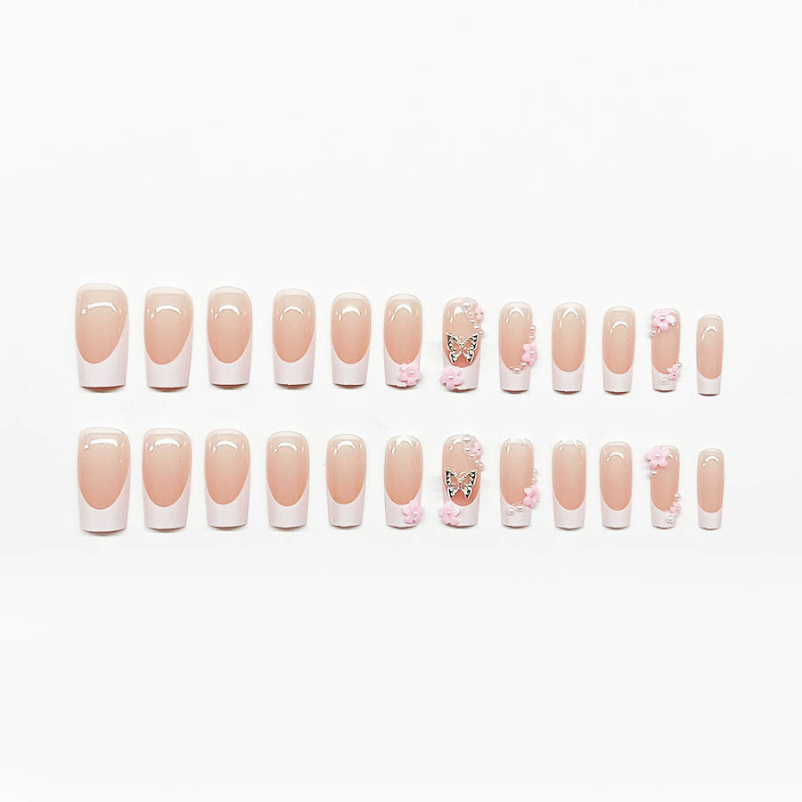 Artificial nail set with playful 3D flowers and glitter accents Stornfield