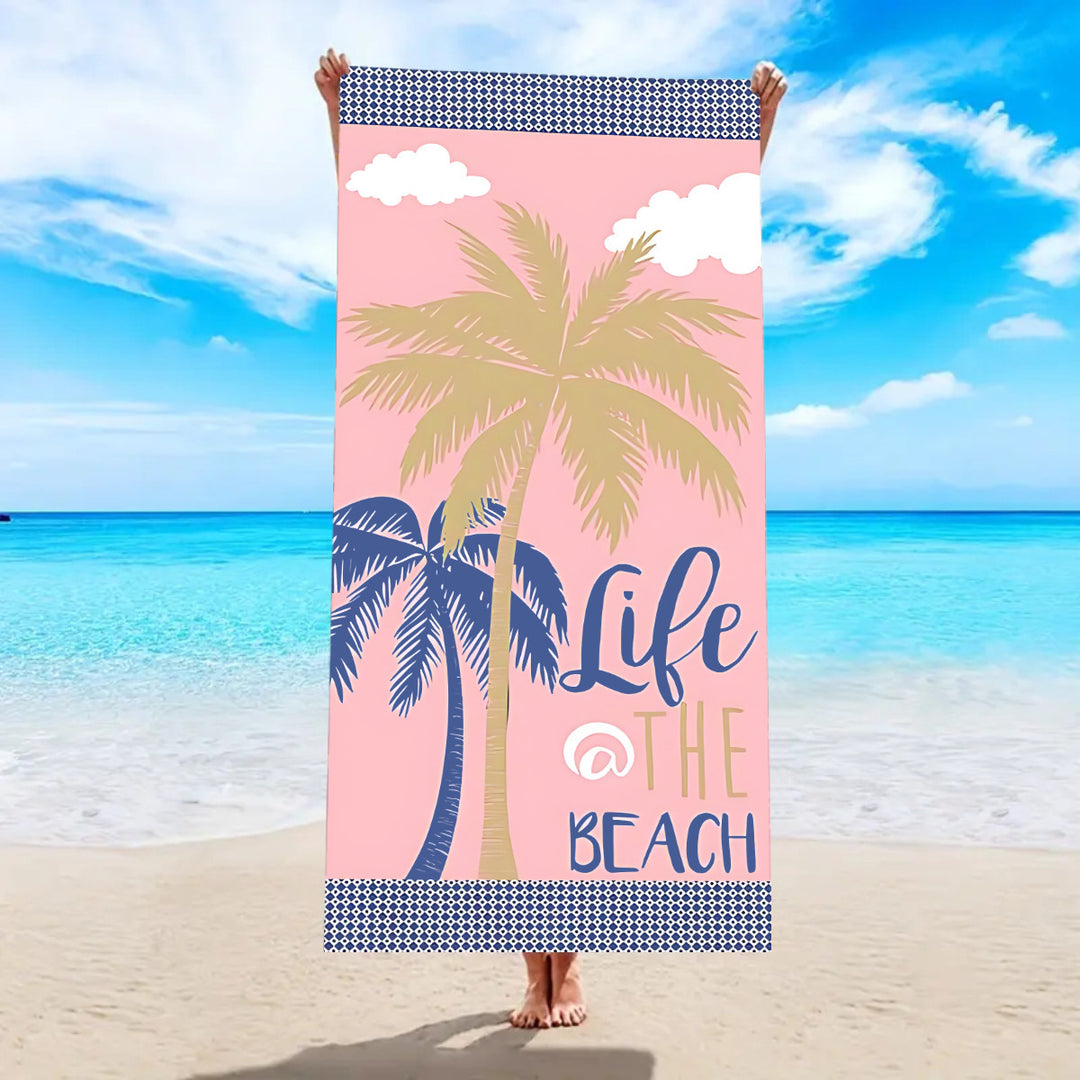 Beach towel with tropical palm leaf pattern Stornfield