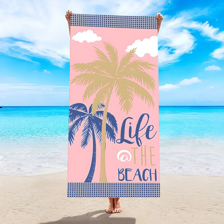 Beach towel with tropical palm leaf pattern Stornfield