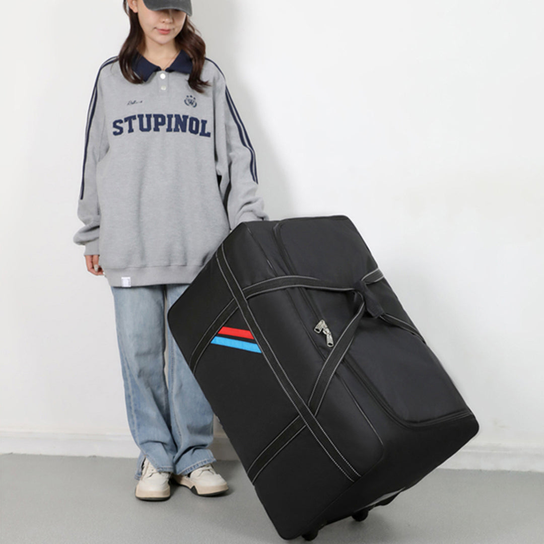Spacious travel bag with lightweight wheels and reinforced carrying handle Stornfield
