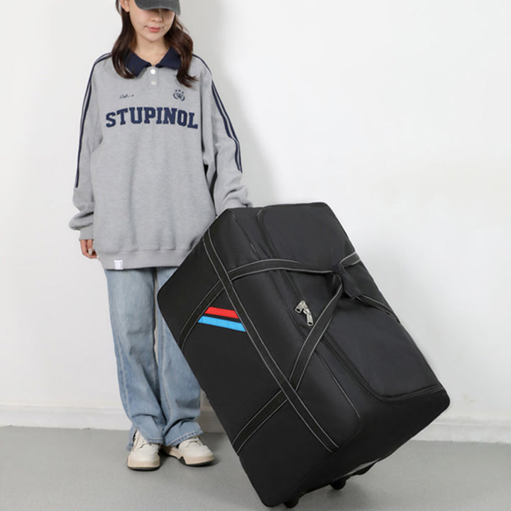 Spacious travel bag with lightweight wheels and reinforced carrying handle Stornfield