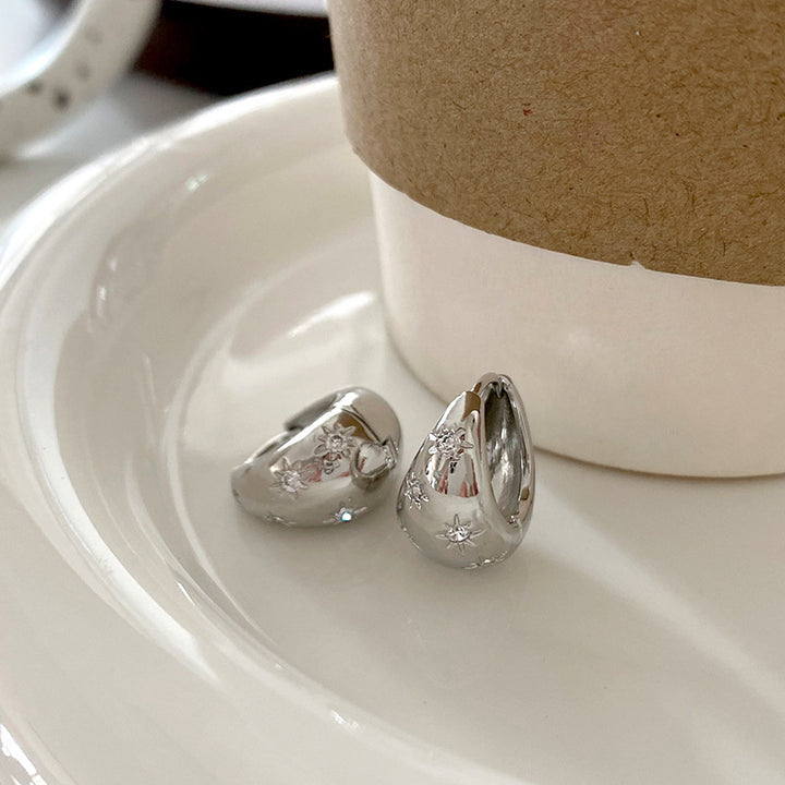 Fashionable earrings with floral design Stornfield