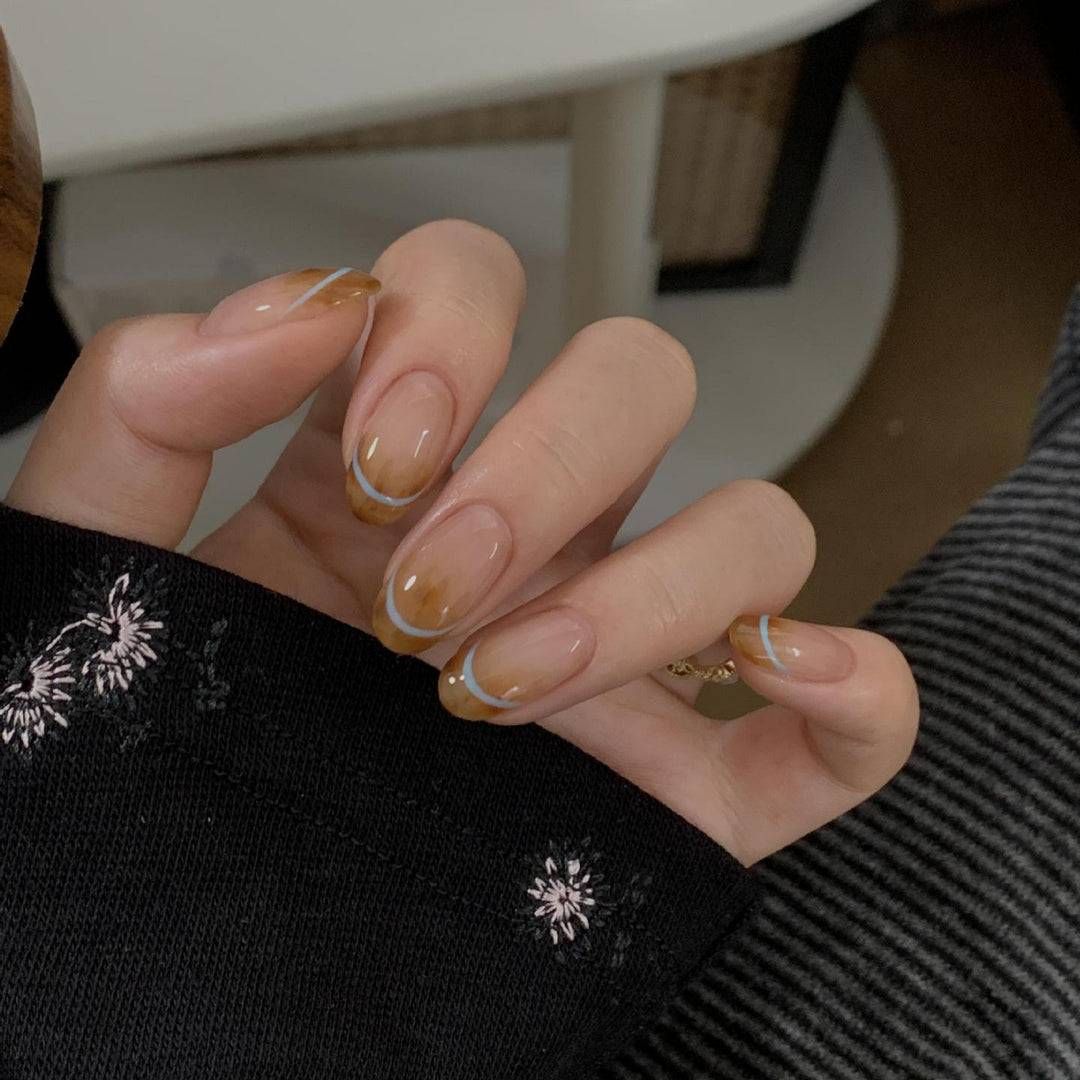 Artificial nails with modern French manicure design Stornfield