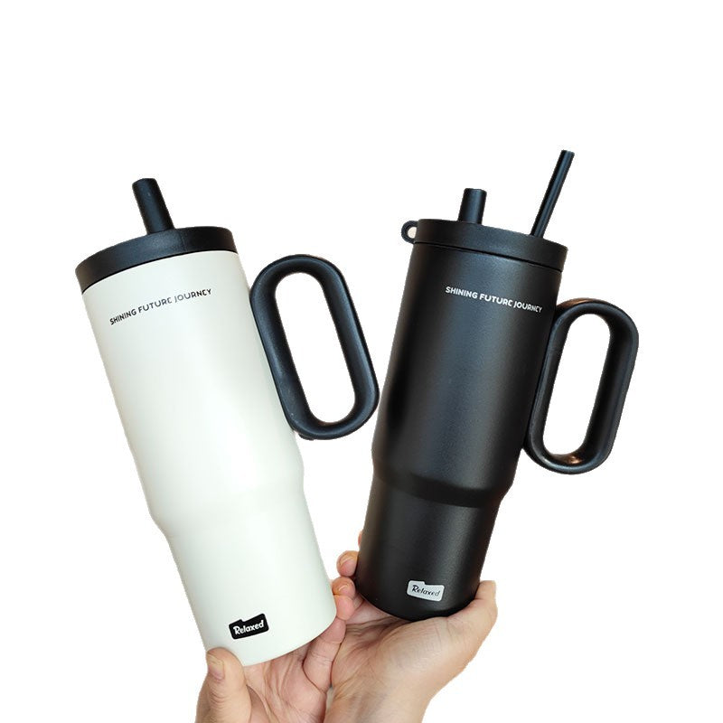 Women insulated drinking container with ergonomic handle Stornfield