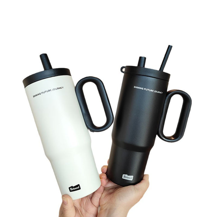 Women insulated drinking container with ergonomic handle Stornfield