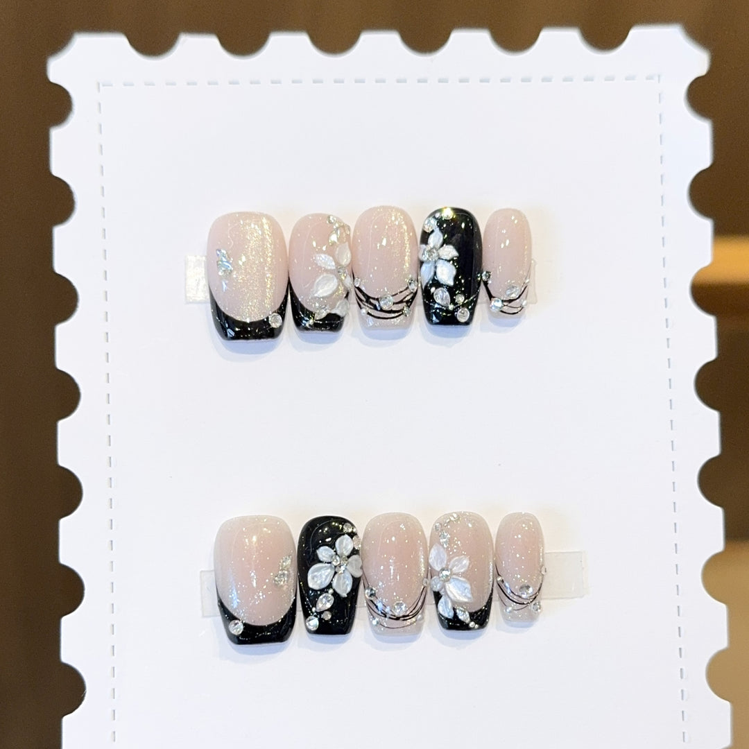 Exclusive artificial nails with floral accents and glitter coating Stornfield